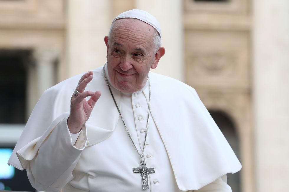 pope-francis-waves-to-the-faithful-as-he-arrives-in-st-news-photo-1609698329_